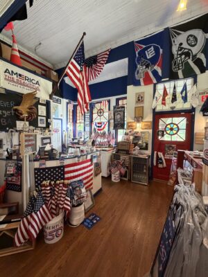Inside the Oradell NJ flag store featuring American flags, military flags, sports team flags, and flag accessories oradell nj flag store product display.jpg
