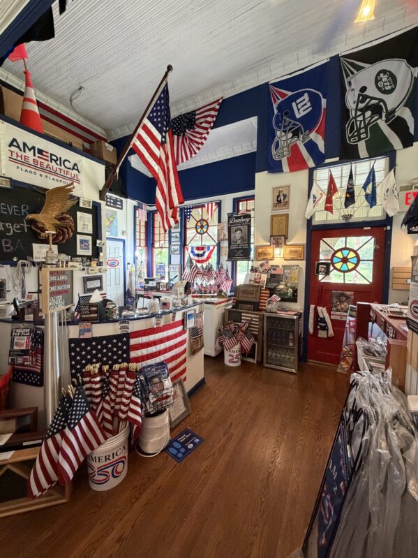 Inside the Oradell NJ flag store featuring American flags, military flags, sports team flags, and flag accessories oradell nj flag store product display.jpg