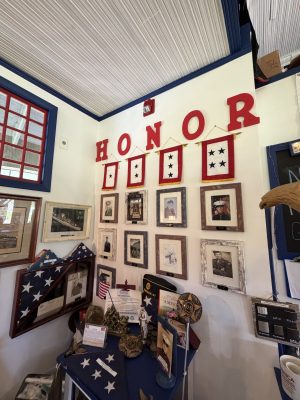 Veteran Honor Wall featuring community members who served in the military at America The Beautiful Flags & Flagpoles in New Jersey