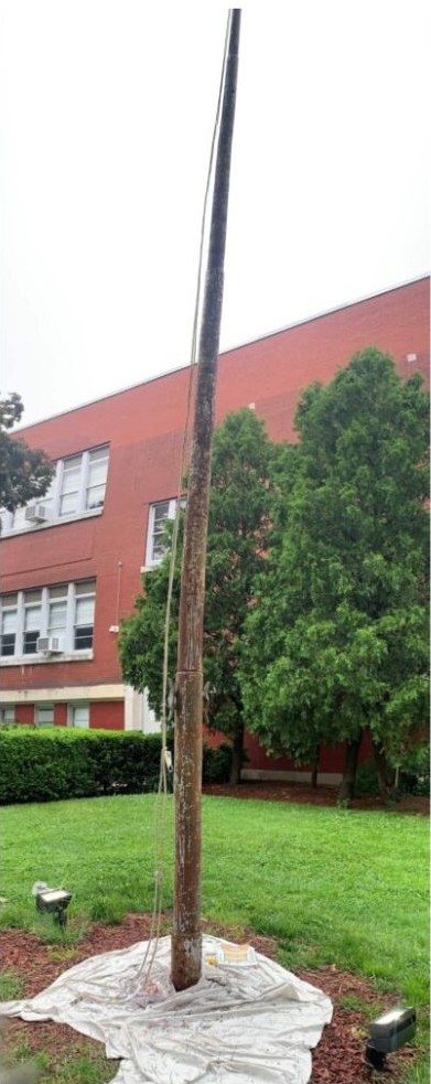 Rusted Flagpole Before Restoration Services Rusted Flagpole Before Professional Restoration Services